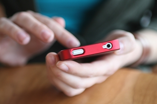 Should Parents Spend Less Time On Their Phones Around Their Children?